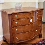 F05. Henredon 4-drawer inlay serpentine chest. 34”h x 42”w x 22”d 